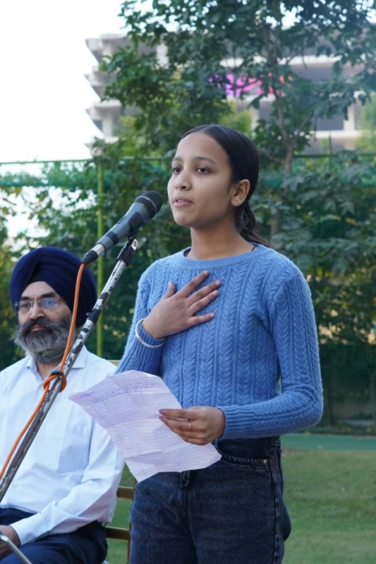 Janya Malhan being the MC for the Pledge Taking Ceremony