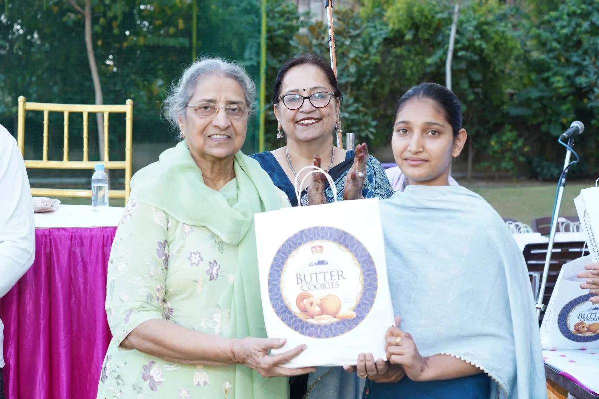 Mrs. Sandhu Giving the Diwali Gifts